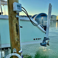 flushmaster mounted on dock connected to dual yamaha motors